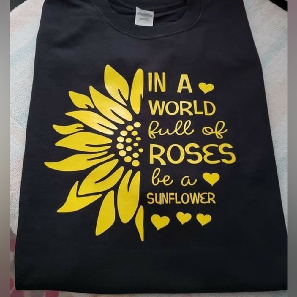 In a world full of roses be a sunflower tee
